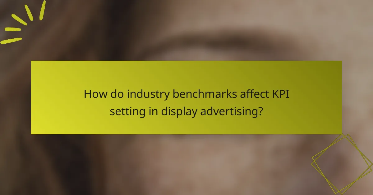 How do industry benchmarks affect KPI setting in display advertising?